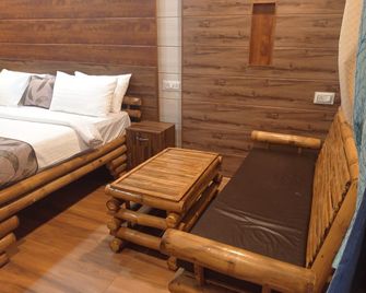 The Palash Vann - Deluxe Rooms - Seoni - Bedroom