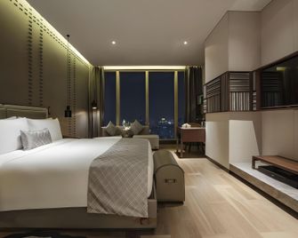 Golden Eagle International Hotel - Nanjing - Bedroom