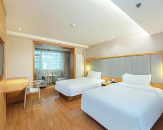 JI Hotel Urumqi Youhao Branch - Ürümqi - Bedroom