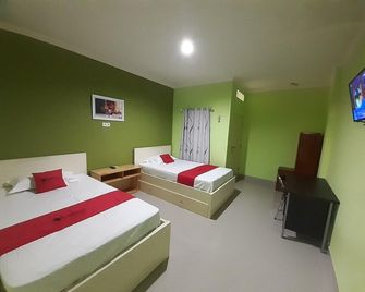 Wisma Cendana - Palembang - Yatak Odası