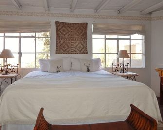 سويتس سانتو دومينجو - سان ميغيل دي الليندي - غرفة نوم