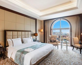 Zhangjiakou International Hotel - Zhangjiakou - Camera da letto