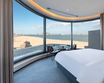 Bay Four Seasons Castle Hotel - Weihai - Schlafzimmer