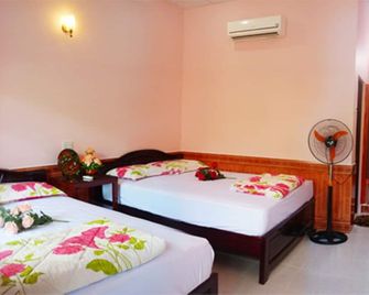 مينه أنه جاردن هوتل - Mũi Né - غرفة نوم