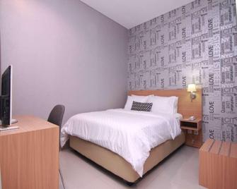 Ehouzz Guest House - Yakarta - Habitación