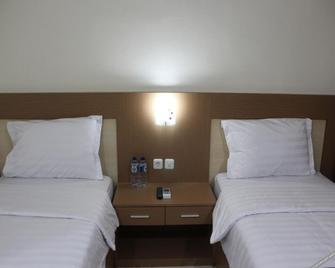 Morse Guest house - Malang - Habitación