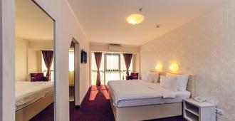 Hotel Philia - Podgorica - Schlafzimmer