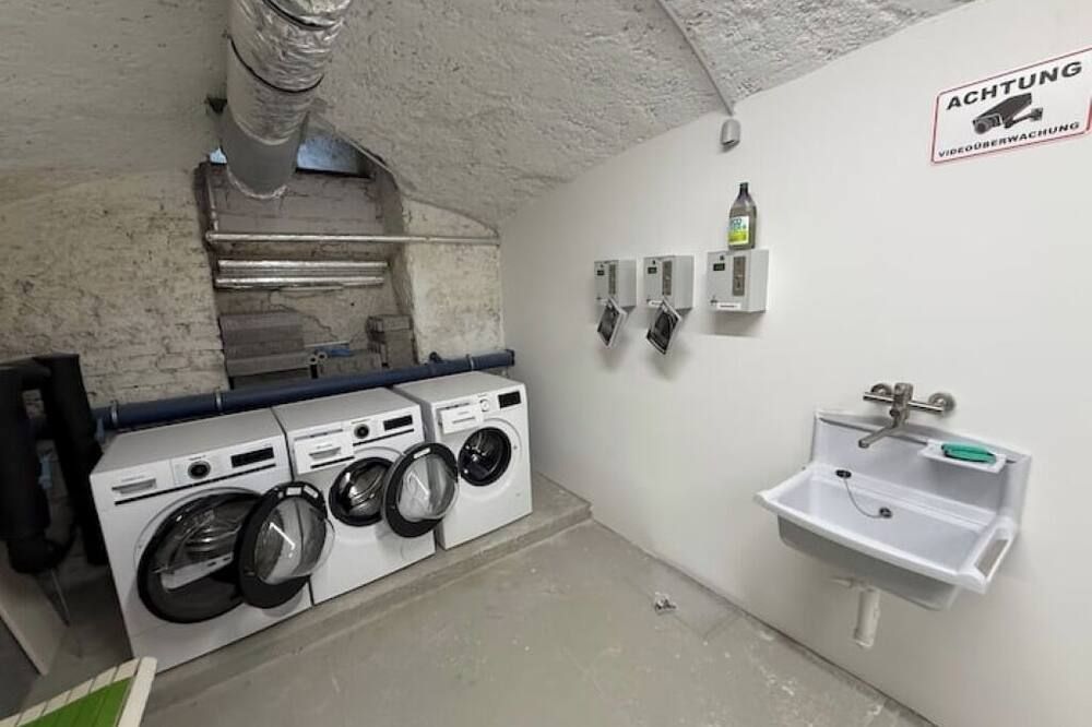 Stylish city apartment in the heart of the Au - everything within walking distance - מינכן - מתקן כביסה