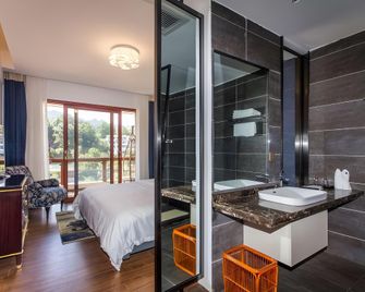 Leading Men Hotel - ג'אנגג'יאיי - חדר שינה