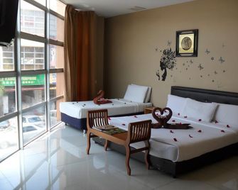Nature Inn Hotel - Klang - Schlafzimmer