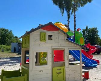 Apartamenty i Pokoje Magnolia - Dźwirzyno