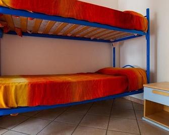 Residence Leonardo - Lido di Spina - Camera da letto