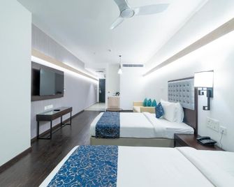 Hotel Deccan Serai Grande, Gachibowli, Hyderabad - Haiderabad - Slaapkamer