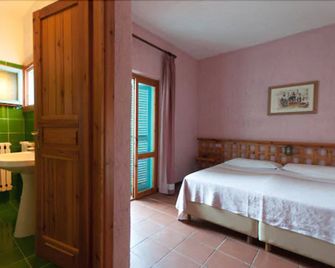 Hotel Scintilla - San Teodoro - Habitación