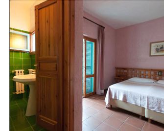 Hotel Scintilla - San Teodoro - Habitación