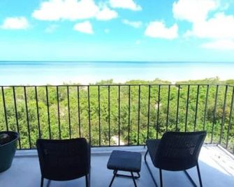 Kuka Casa de playa Linda villa al frente del mar - Sisal - Ban công