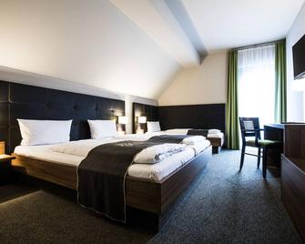 Riku Hotel Weißenhorn - Weißenhorn - Bedroom