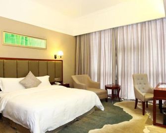 Changsha Jiaxing Inn - צ'נגשה - חדר שינה