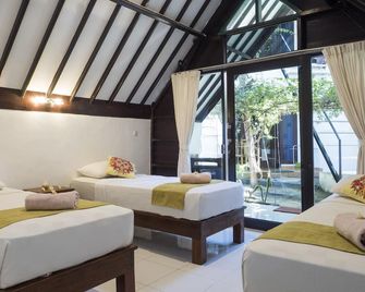 Gili Turtle Beach Resort - Pemenang - Bedroom