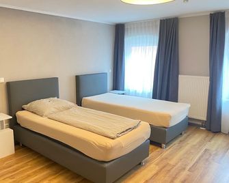 Motel Q - Dingolfing - Dingolfing - Ložnice