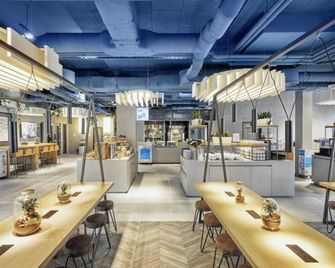 H2 Hotel Düsseldorf Seestern by Sunday Hotels - דיסלדורף - מסעדה