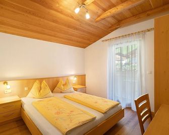 Speckign Apartment 1 - Cadipietra/Steinhaus - Спальня