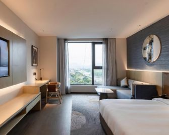 Fuzhou Zhonghai Kaili Hotel - פוז'ו - חדר שינה