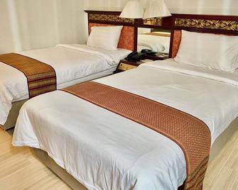 وانجكوم هوتل - تشيانغ راي - غرفة نوم