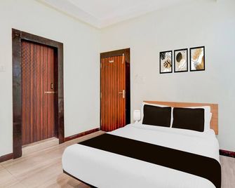OYO Flagship 39786 Oxy Royal Residency - ראנצ'י - חדר שינה