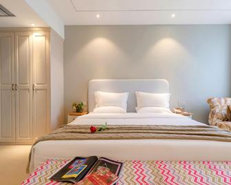Scenery Hotel - Luoyang - Yatak Odası