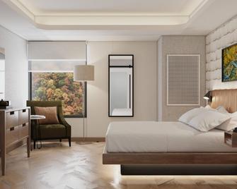 Hotel Indigo Gatlinburg Downtown By IHG - Gatlinburg - Bedroom