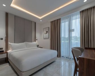 ذا بيليكان هوتل كانتونمينتس أكرا - أكرا - غرفة نوم