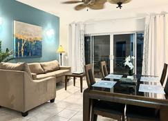 Paradise Breeze Penthouse- Majestic Ocean Views -Central Location - Venetian Road Settlement - Living room