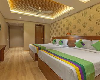 Treebo Windsor Heights - Ooty - Bedroom