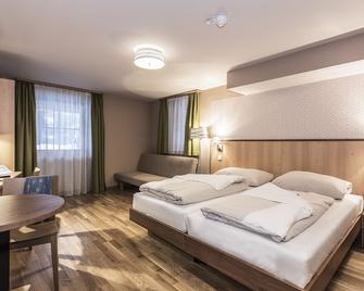 Hotel Jufa Grundlsee - Gössl - Schlafzimmer