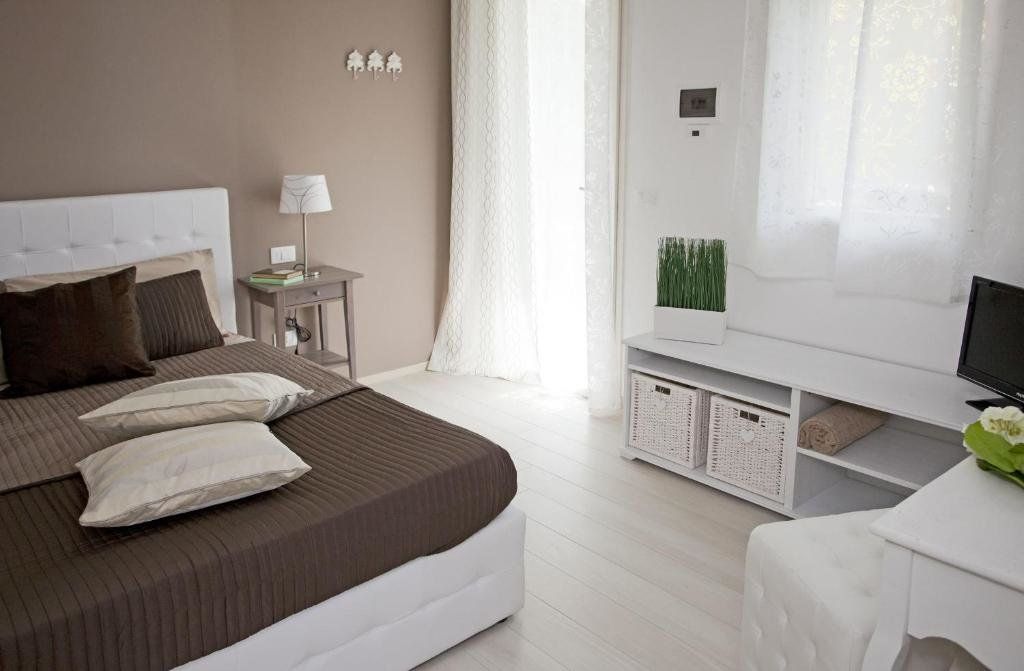 Dimora delle Emme - ראבנה - חדר שינה