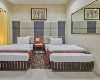 Elphinstone Hotel - Mumbai - Phòng ngủ