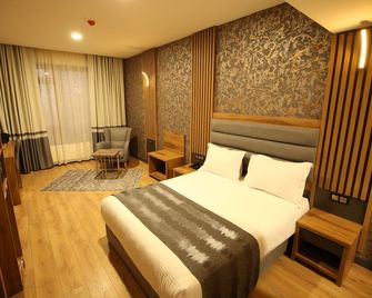 Büpa Plus Hotel - Kayseri - Schlafzimmer