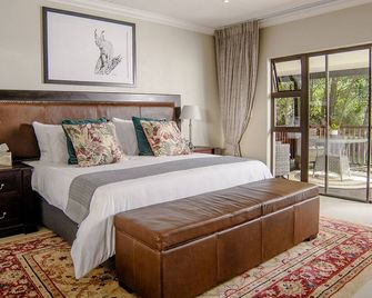 The Reserve Boutique Hotel - הייזיוויו - חדר שינה