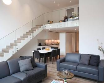 The City Zug Apartments - Zug - Obývací pokoj