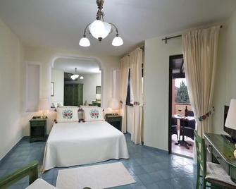 Cala Ginepro Hotel Resort - Cala Liberotto - Bedroom