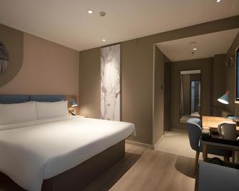 Home Inn Neo Urumqi Beijing South Road Railway Bureau Metro Station - אורומצ'י - חדר שינה