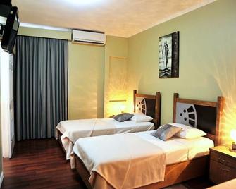 Culture Crossroads Inn - Port-of-Spain - Schlafzimmer