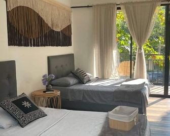 Hotel Rossé - La Vega - Schlafzimmer