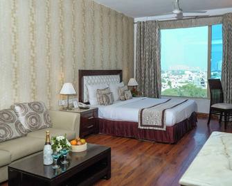 Treehouse Queens Pearl - Gurugram - Habitación