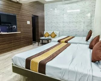 Hotel Prabhat Palace - Kota - Slaapkamer