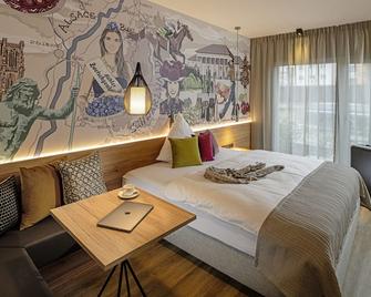 Adoro Aparthotel - Bühl - Schlafzimmer