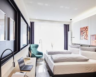 Design- und Kunsthotel München - Múnich - Habitación