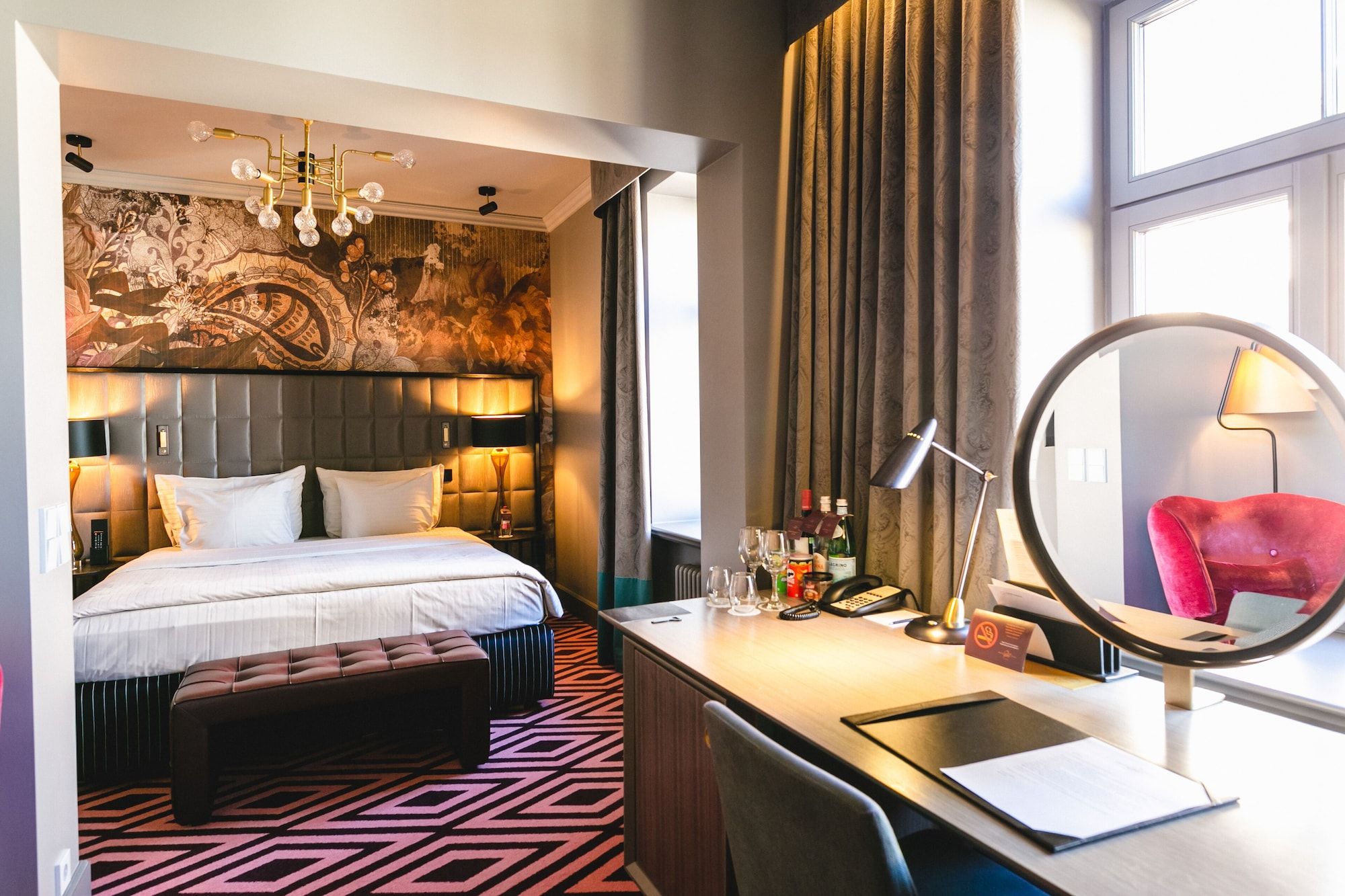 Bedroom view of Grand Poet Hotel By Semarah