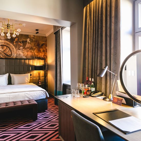 Bedroom view of Grand Poet Hotel By Semarah